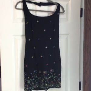 Black with vibrant colors worn once to a wedding